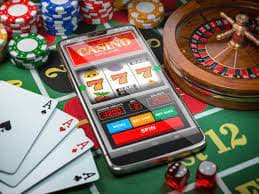 Mobile phone showing 303hoki login live-dealer interface with blackjack table and betting controls